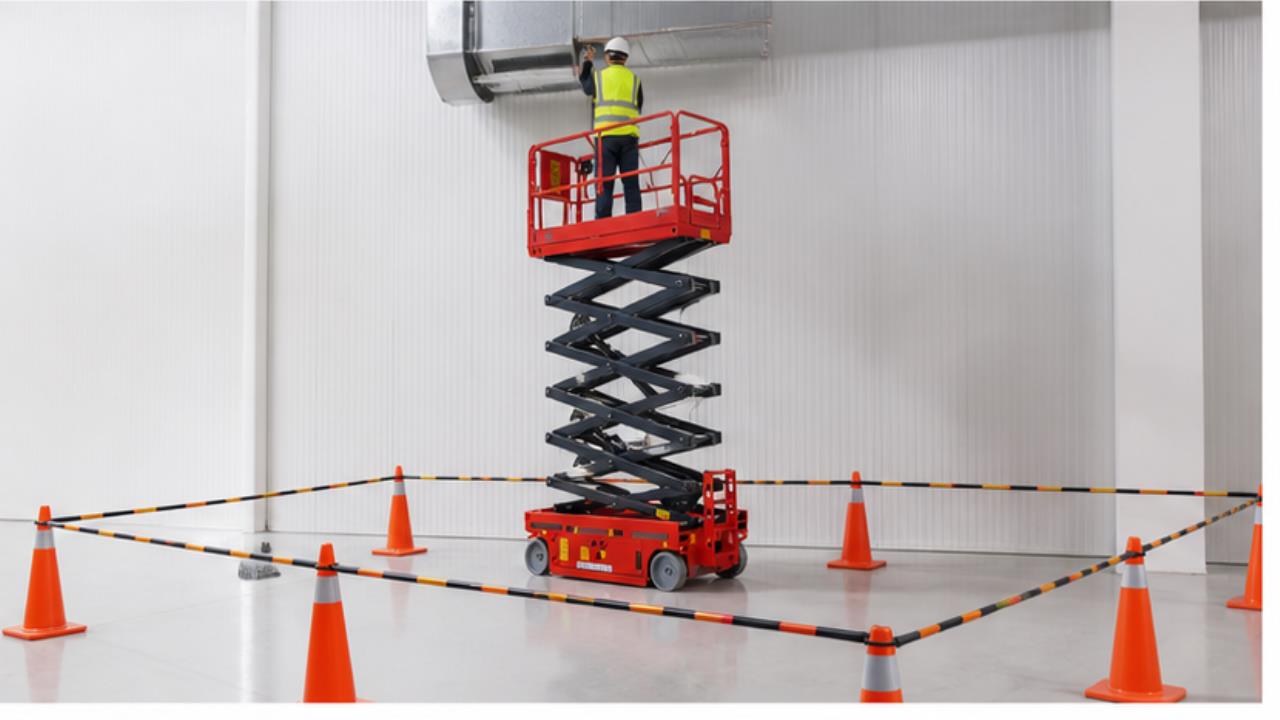 ZG-LDZX Crawler Scissor Lift in a bright operating scene