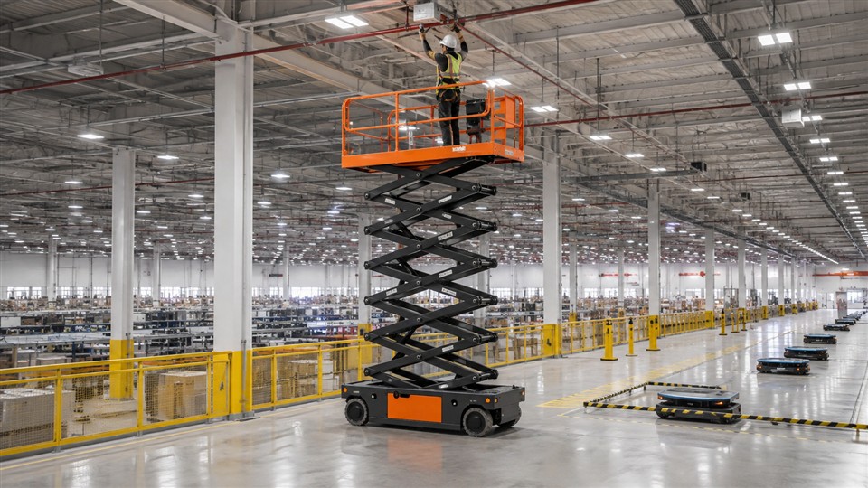 Electric scissor lift inspecting high-bay lighting and sprinkler systems