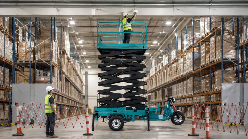 GTJZ3812E-X electric scissor lift in a September 2026 work scenario